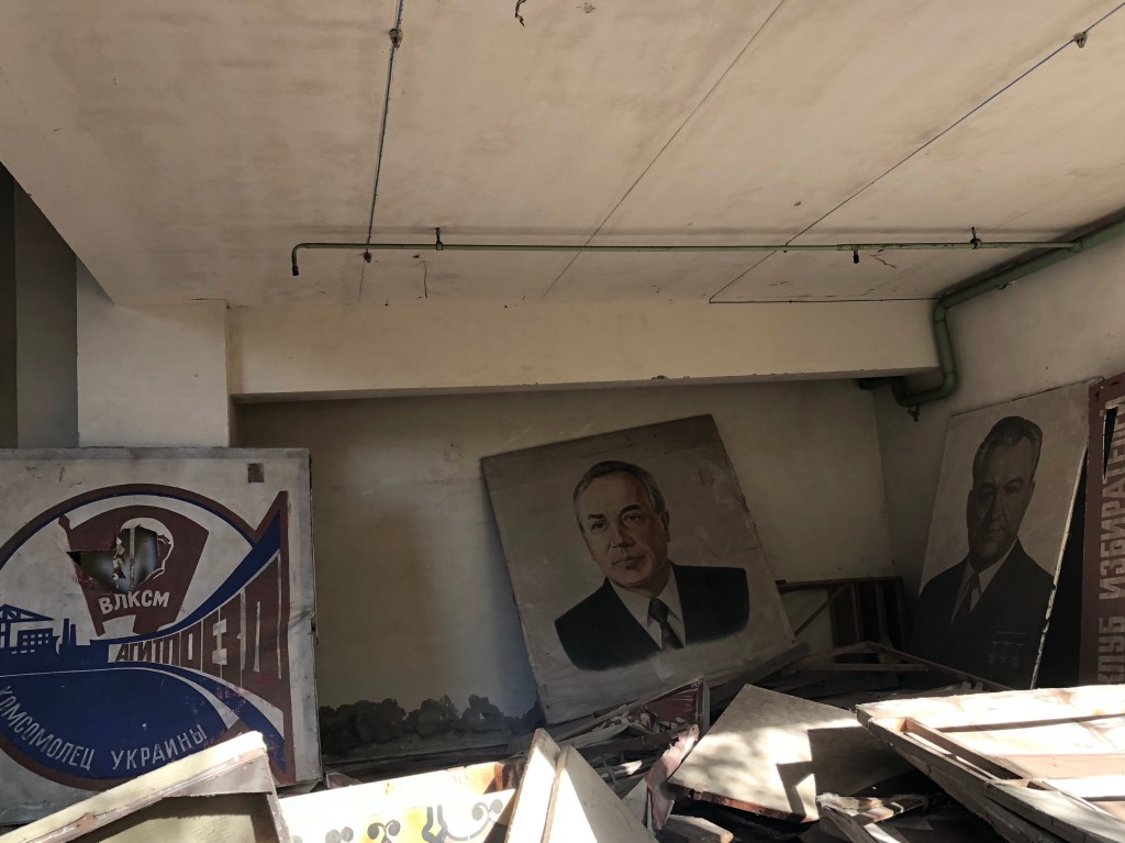 A room from the municipality building in Pripyat, full with placards of Communist leaders, that were supposed to be carried during the manifestation on 1st May, 1986
