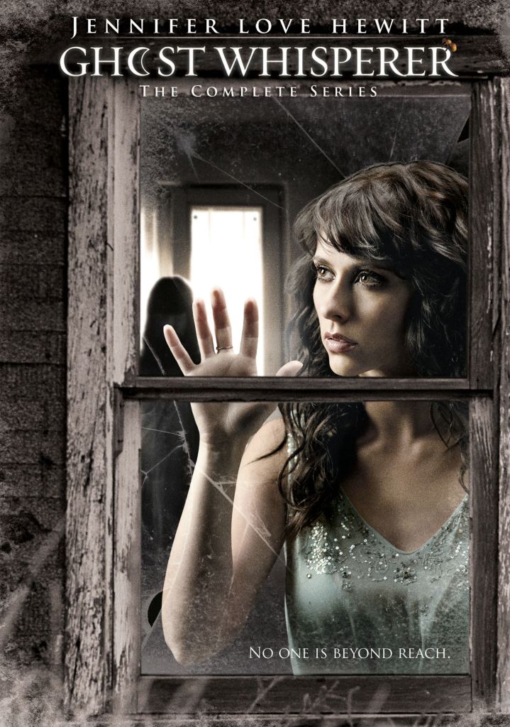 A girl standing behind the glass of a broken window. There is a ghost visible behind her.