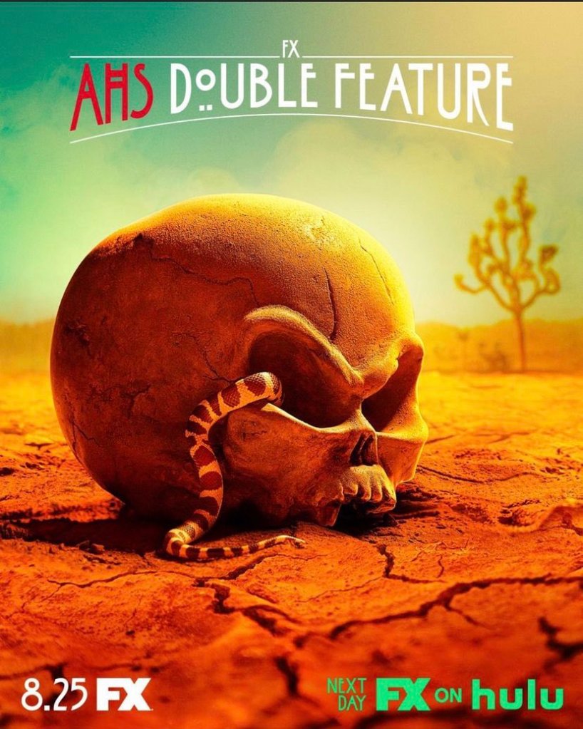 A strange skull with a snake coming out of its eye socket.